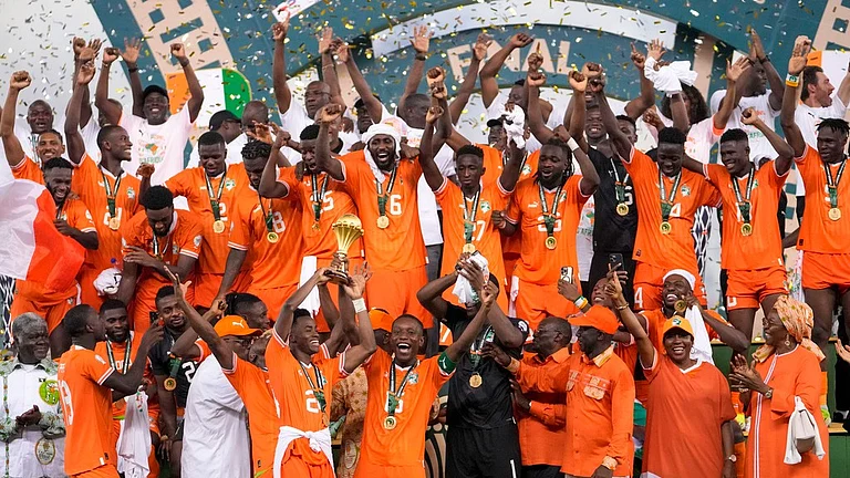 Ivory Coast players celebrate after winning the AFCON African Cup of Nations 2024 final match against Nigeria at the Olympic Stadium of Ebimpe in Abidjan on February 11, 2024. - AP