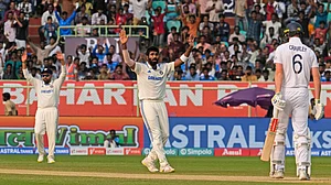 AP Photo/Manish Swarup : Jasprit Bumrah reacts after a delivery on the third day of the second Test match between India and England in Visakhapatnam.