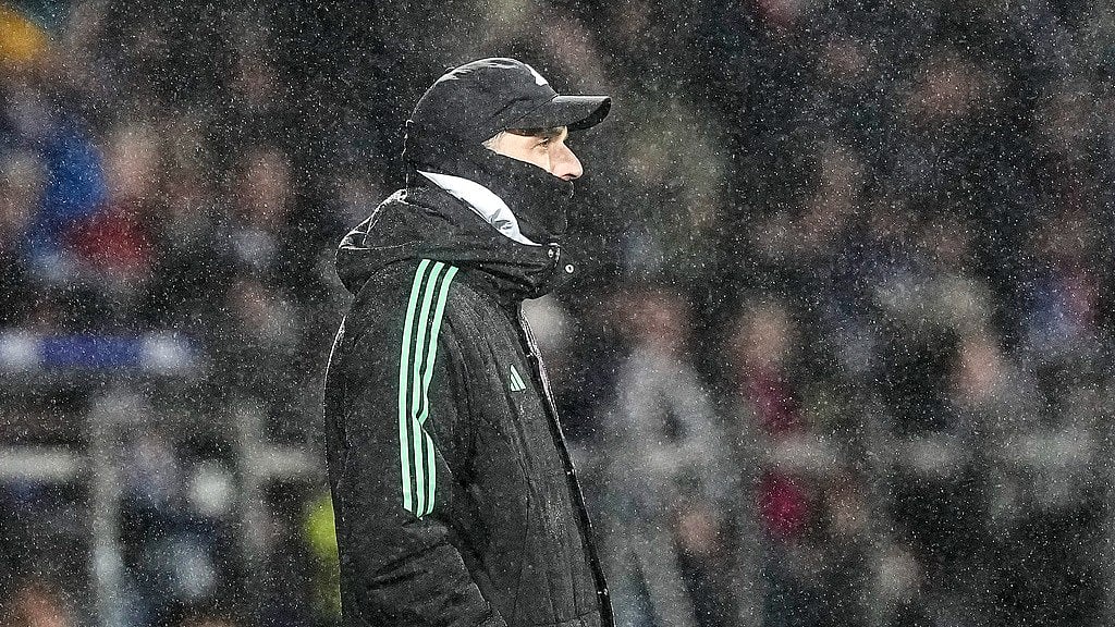 Bayern Munich's head coach Thomas Tuchel stands in the rain during their German Bundesliga football match against VfL Bochum in Bochum on February 18, 2024. Bochum defeated Bayern 3-2. - AP