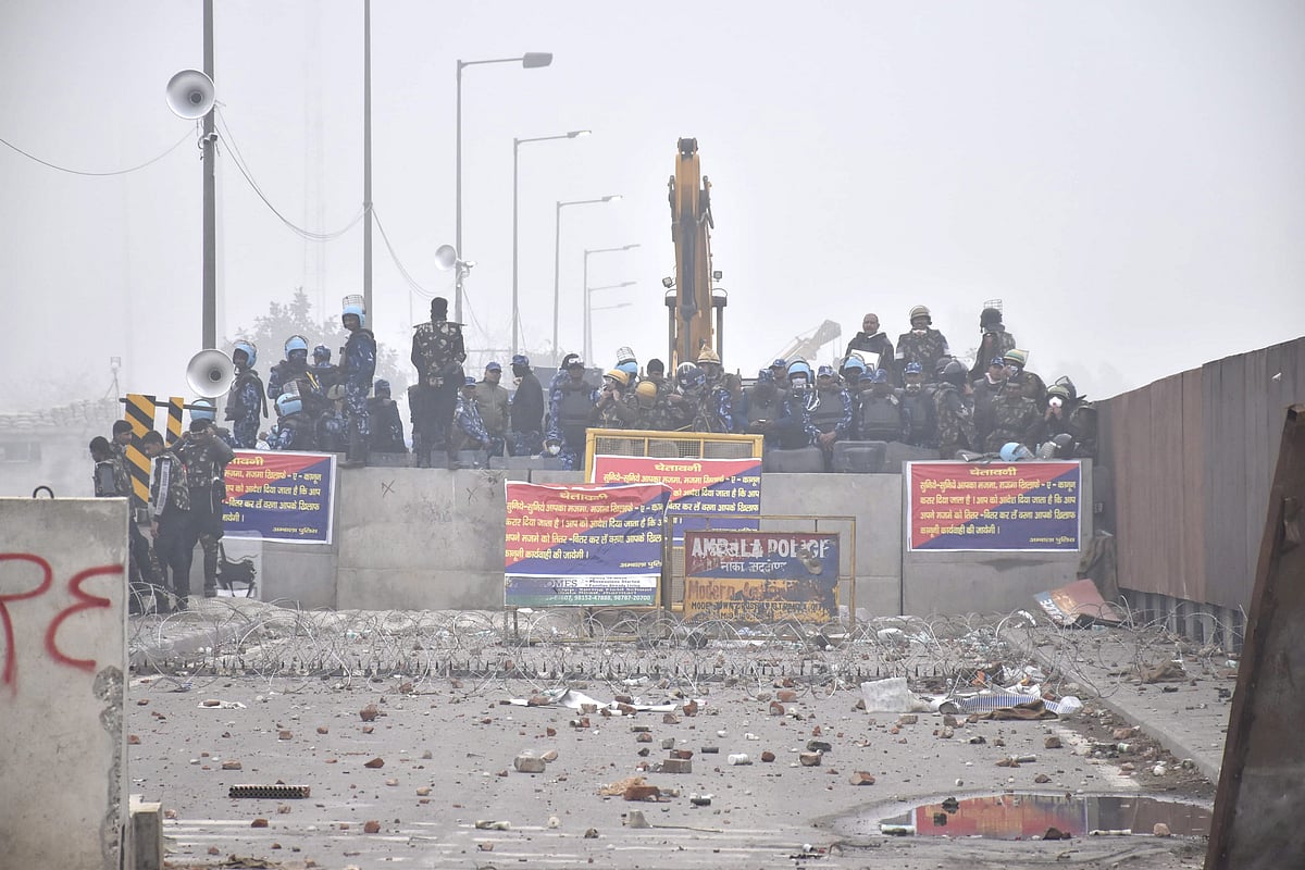 Security personnel stand guard during the protesting farmers' 'Delhi Chalo' march, near the Punjab-Haryana Shambhu Border, in Patiala district, Wednesday, Feb. 21, 2024.  - PTI/File