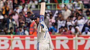 AP Photo/Manish Swarup : Shubman Gill celebrates his fifty runs on the third day of the second Test match between India and England in Visakhapatnam.