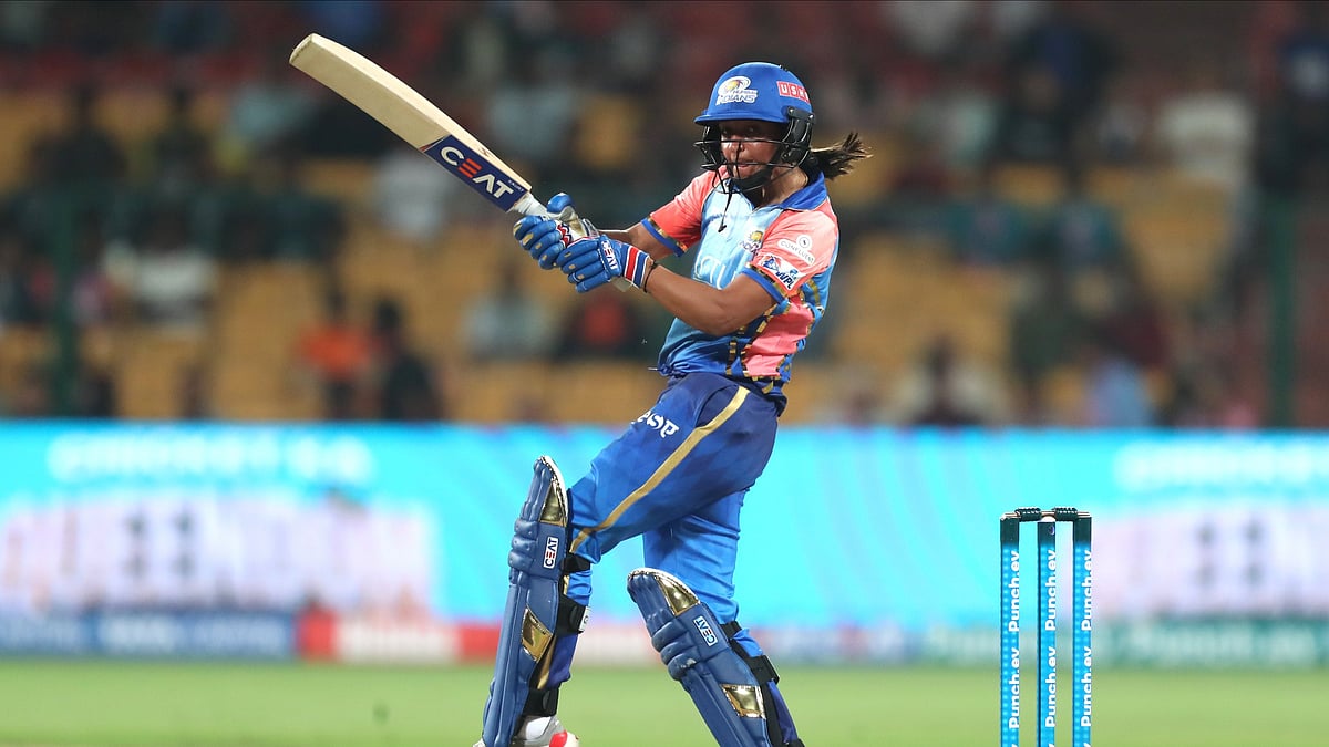 Photo: X/ @wplt20 : Mumbai Indians captain Harmanpreet Kaur playing a shot during her unbeaten innings against Gujarat Giants in WPL 2024.