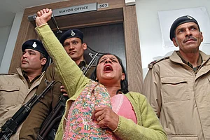 PTI : AAP councillor Prem Lata raises slogans during a protest after the Chandigarh mayoral election