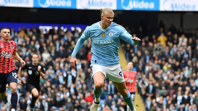 Erling Haaland controls the ball during the English Premier League football match between Manchester City and Everton. - AP Photo/Rui Vieira