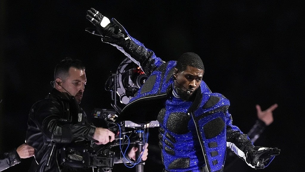 AP : Usher performs during the half time of NFL Super Bowl LVIII 