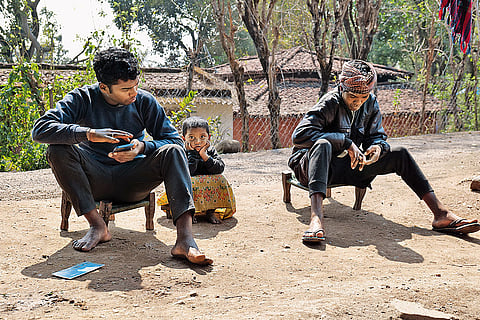 A Munda family relaxing in a village in Lohardaga, Jharkhand