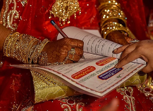 Photo via Getty Images : An Indian Muslim bride participates in a mass marriage. (Representative Image)