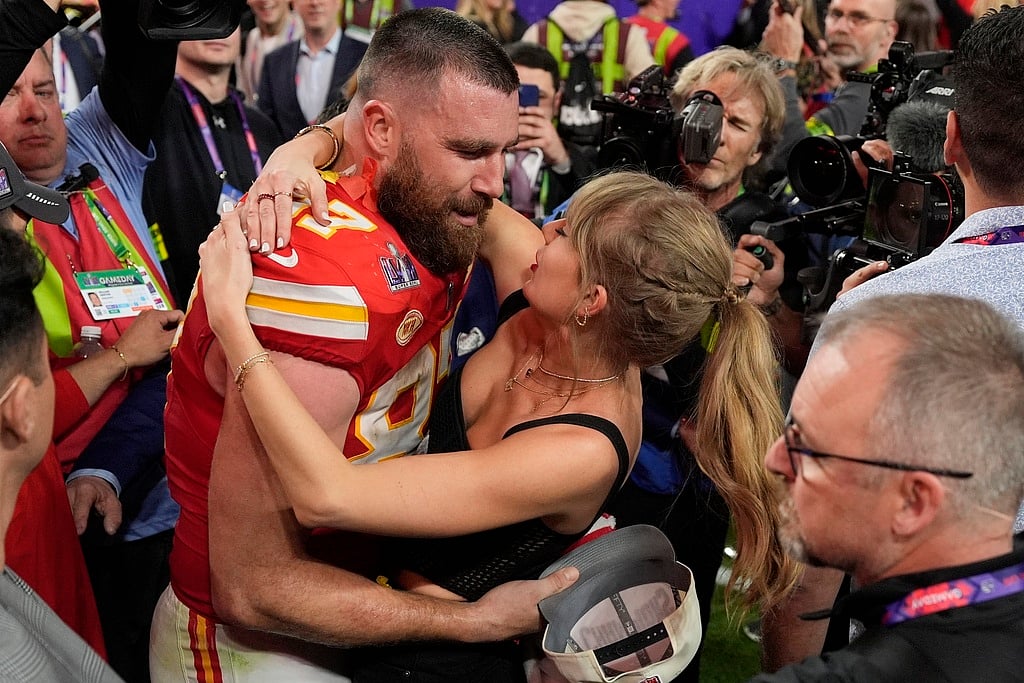 John Locher/ AP : Taylor Swift and Travis Kelce