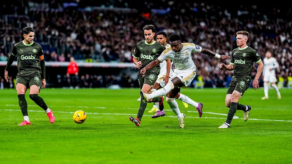 Real Madrid's Vinicius Junior tries a shot during a Spanish La Liga soccer match between Real Madrid and Girona at the Santiago Bernabeu stadium in Madrid, Spain, Saturday, Feb. 10, 2024.  - (AP Photo/Manu Fernandez)


