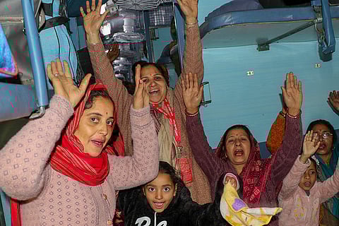 Devotees in Astha train