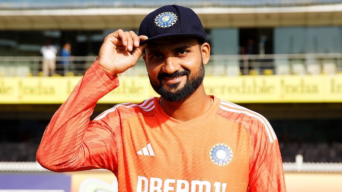 Akash Deep poses with the Indian cap. - X/BCCI