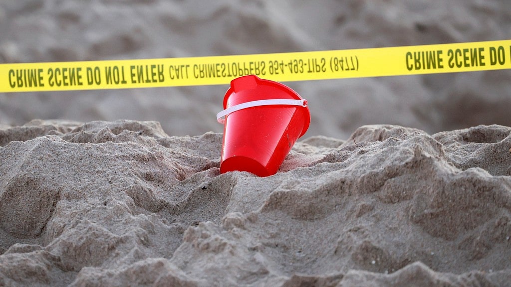 AP : Girl died after getting trapped in sand hole in Florida.
