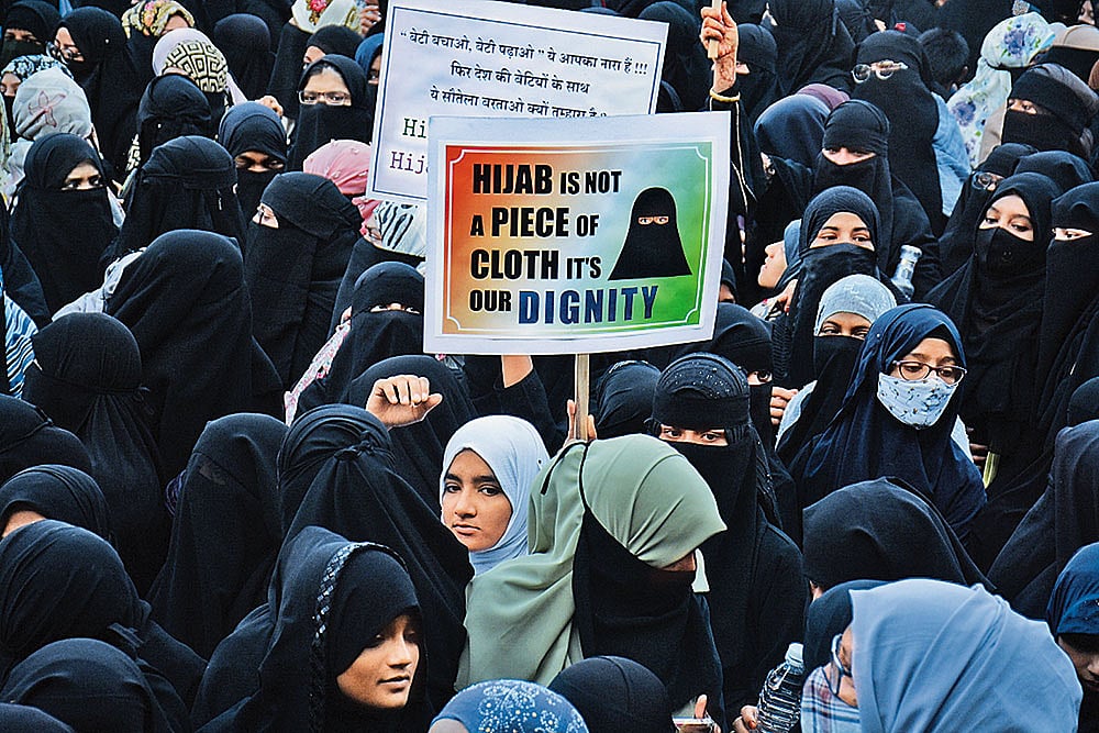 Photo: Getty Images : Muslim Women in Solidarity: Women protest  against the previous Karnataka government’s decision to protest the ban on the hijab