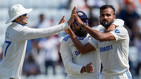 Akash Deep, right and Shubman Gill, left celebrate the wicket of Ben Duckett on the first day of the fourth cricket Test match between England and India in Ranchi.
