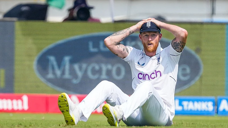 Captain Ben Stokes reacts while fielding on the second day of the third cricket Test match between India and England in Rajkot.