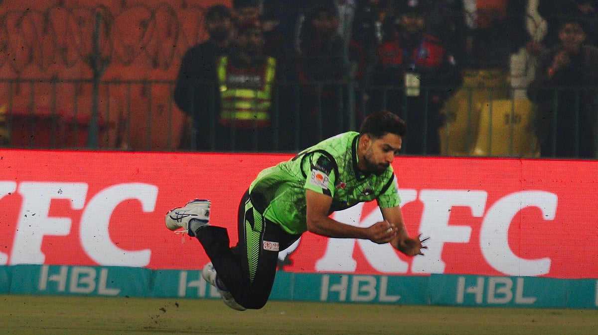 Photo Courtesy: X/ @lahoreqalandars : Lahore Qalandars' Haris Rauf fielding in Pakistan Super League 2024.