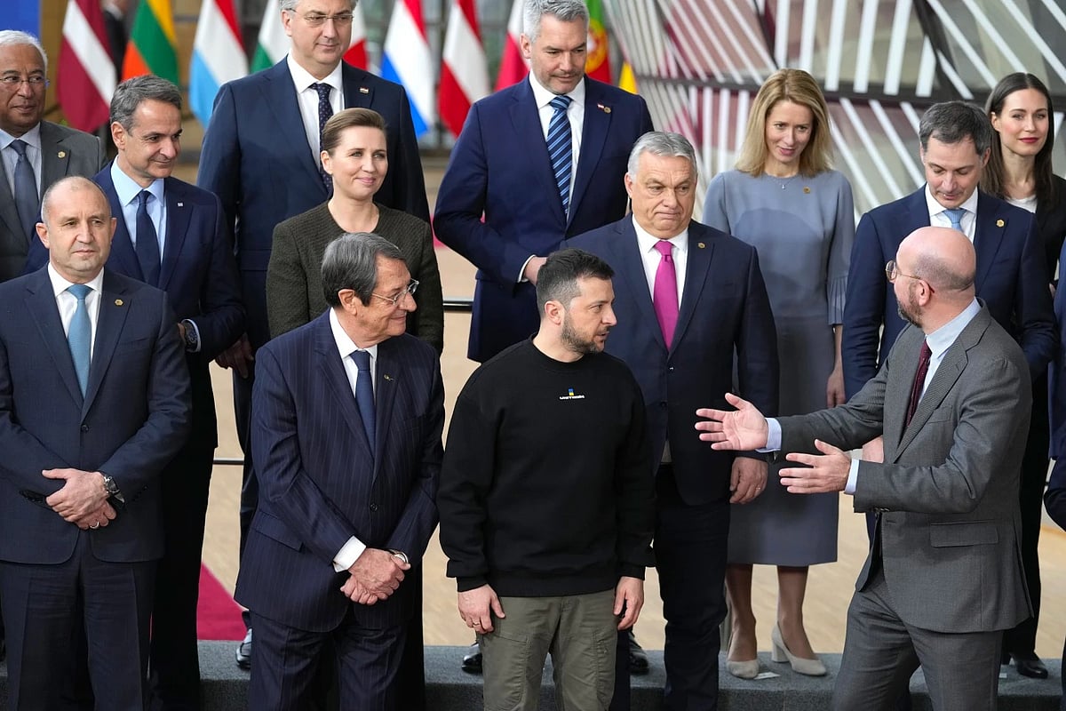 (AP Photo) : European Council President Charles Michel, front right, speaks with Ukraine’s President Volodymyr Zelenskyy, front second right, and Hungary’s Prime Minister Viktor Orban, second-row centre at an EU summit in Brussels 

