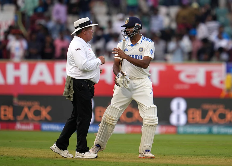 Ravichandran Ashwin talks to umpire Marais Erasmus after the end of the first day of the second cricket Test match between India and England in Visakhapatnam. - AP/Manish Swarup