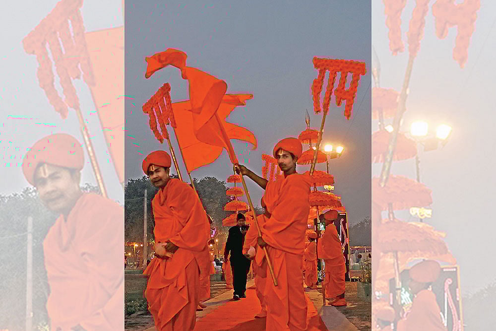 Photo: Suresh K. Pandey : Spiritual Duty: Sadhus celebrating the consecration of the Ram temple in New Delhi