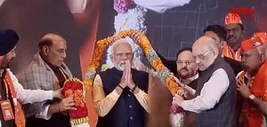 PTI : BJP leadership garlanding PM Narendra Modi |