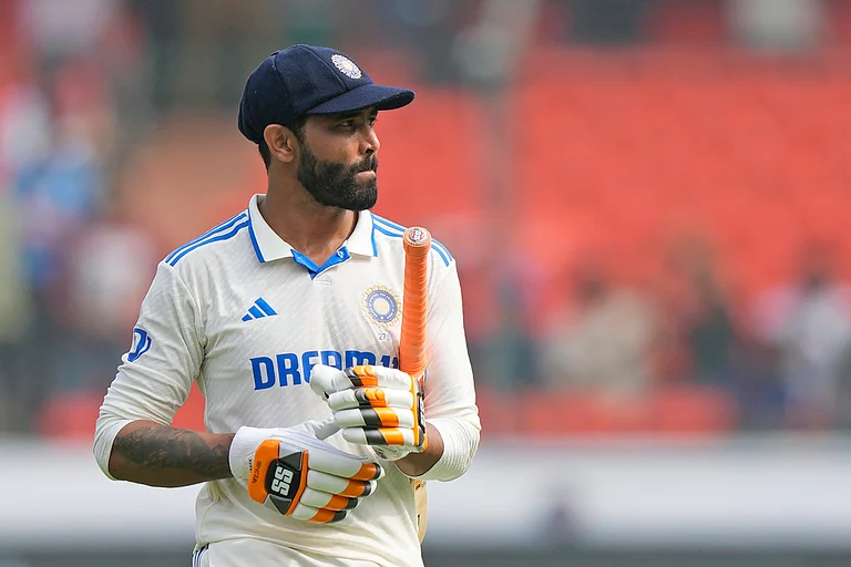 Ravindra Jadeja reacts as he walks back to the pavilion after losing his wicket to Joe Root on the third day of the first cricket Test match between England and India in Hyderabad. - AP/Mahesh Kumar A.