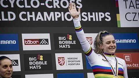 19-year-old British prodigy waves to the crowd.