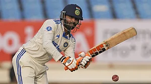 AP/Ajit Solanki : Ravindra Jadeja plays a shot on the first day of the third cricket Test match between England and India in Rajkot.
