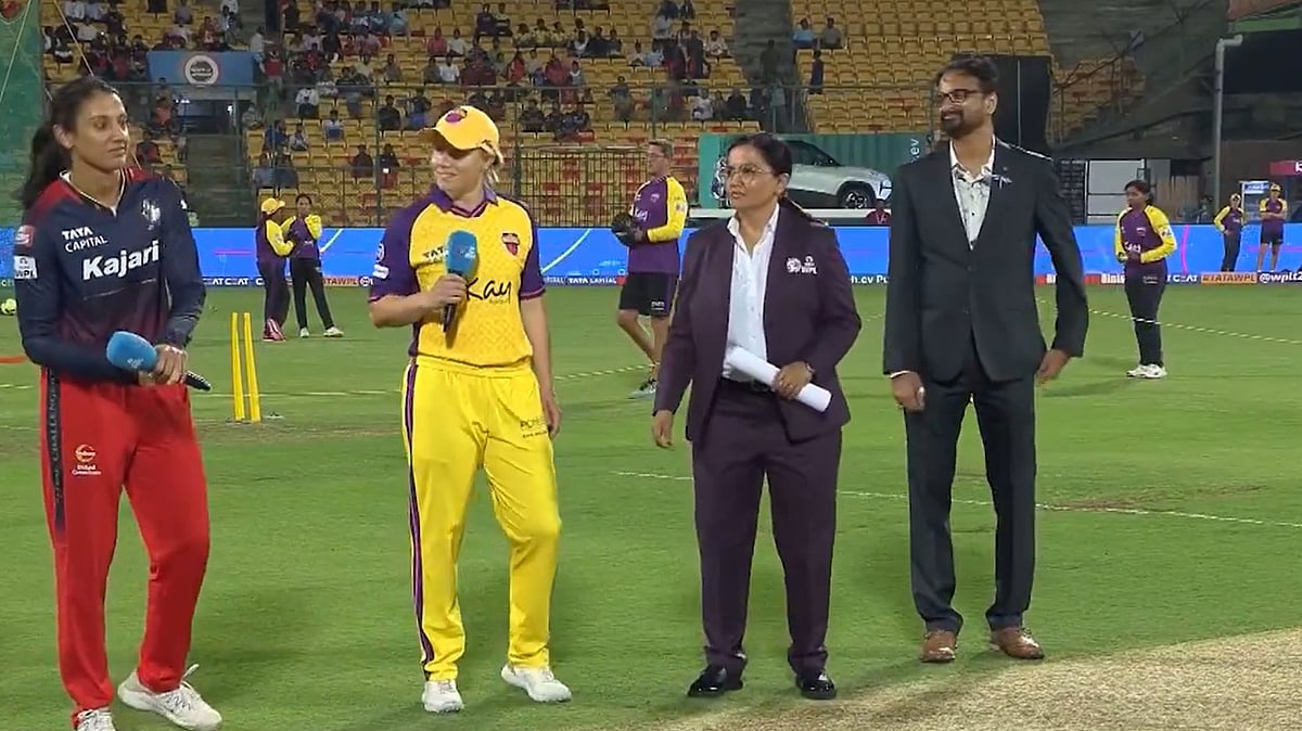 X/@wplt20 : Captains Smriti Mandhana (left) and Alyssa Healy at the toss for the Royal Challengers Bangalore vs UP Warriorz match in the Women's Premier League at M Chinnaswamy Stadium. 