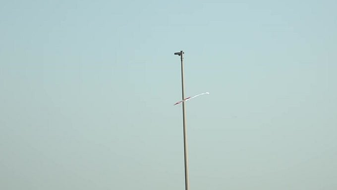 PTI : Kite flies near pole in skies at farmers' protest site near Delhi borders |