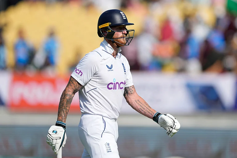 England's captain Ben Stokes leaves the field after losing his wicket on the fourth day of the third cricket test match between England and India in Rajkot, India, Sunday, Feb. 18, 2024.
 -  (AP Photo/Ajit Solanki)

