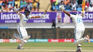 AP : Yashasvi Jaiswal, left, and Sarfaraz Khan during Day 4's play of the India vs England third Test in Rajkot on February 18, 2024.