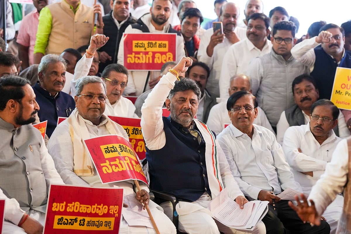 PTI : Karnataka Chief Minister Siddaramaiah, Deputy Chief Minister DK Shivakumar and other Karnataka Congress leaders during a protest against the centre, at Jantar Mantar, in New Delhi, Wednesday, Feb. 7 | 