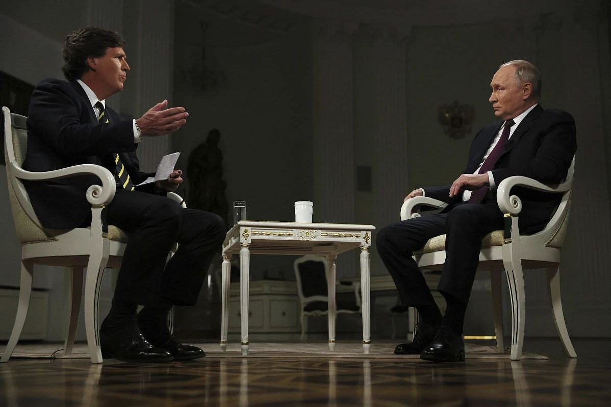 AP photo : Vladimir Putin in an interview with former Fox News host Tucker Carlson 