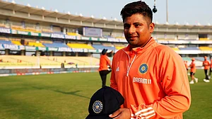 BCCI : Sarfaraz Khan posing with his Indian senior cap ahead of the Rajkot Test.