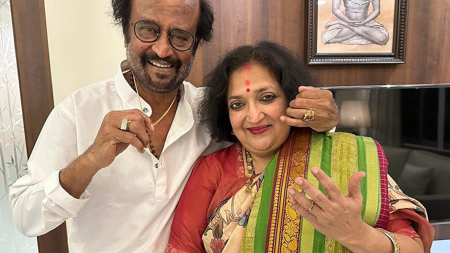 X : Rajinikanth with wife Latha