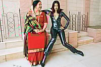 Traditional In The Modern Photo: Getty Images : The Contrast: An Indian mother poses with her model daughter.