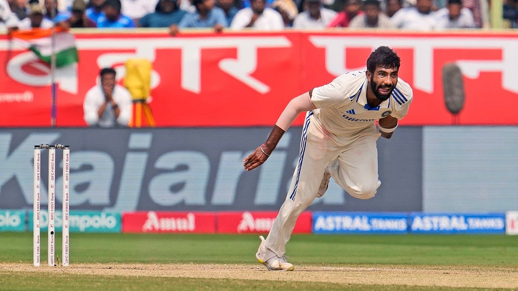 AP Photo/Manish Swarup : Jasprit Bumrah bowls a delivery on the fourth day of the second cricket test match between India and England in Visakhapatnam.