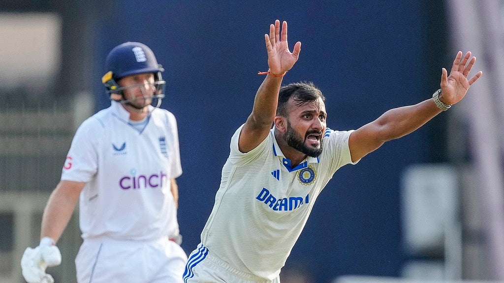 AP Photo/Ajit Solanki : Akash Deep, right appeals unsuccessfully for the leg before wicket of Joe Root on the first day of the fourth Test match between England and India in Ranchi.