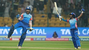 PTI : Sajeevan Sajana (left) exults after hitting the last-ball six that won the match for Mumbai Indians, against Delhi Capitals in the Women's Premier League 2024 in Bengaluru.