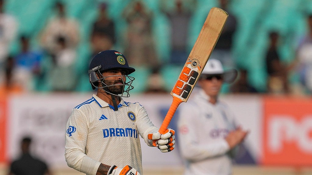 AP/Ajit Solanki : Ravindra Jadeja celebrates his century on Day 1 of the third India vs England Test in Rajkot on Thursday, February 15.