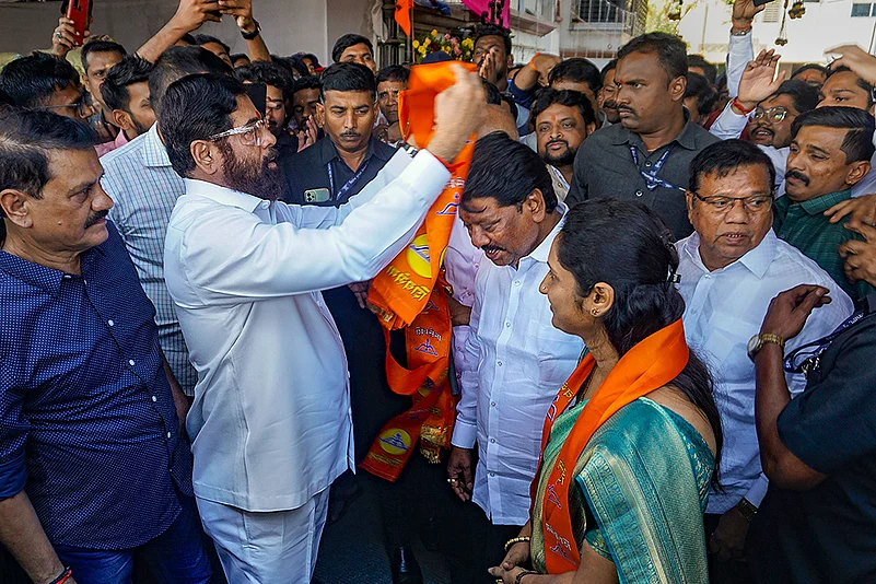 Eknath Shinde with party workers in Thane