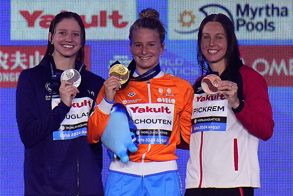 | Photo: AP/Hassan Ammar : World Aquatics Championships 2024