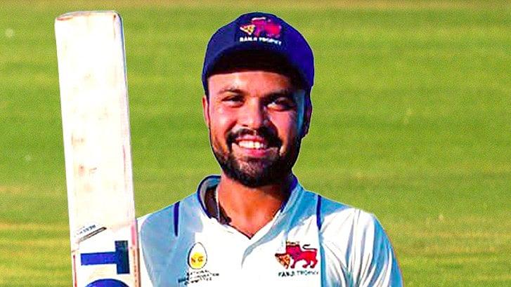 Photo: X/ @MumbaiCricAssoc : Mumbai's wicket-keeper batter Hardik Tamore after scoring a century against Baroda in Ranji Trophy 2023-24.