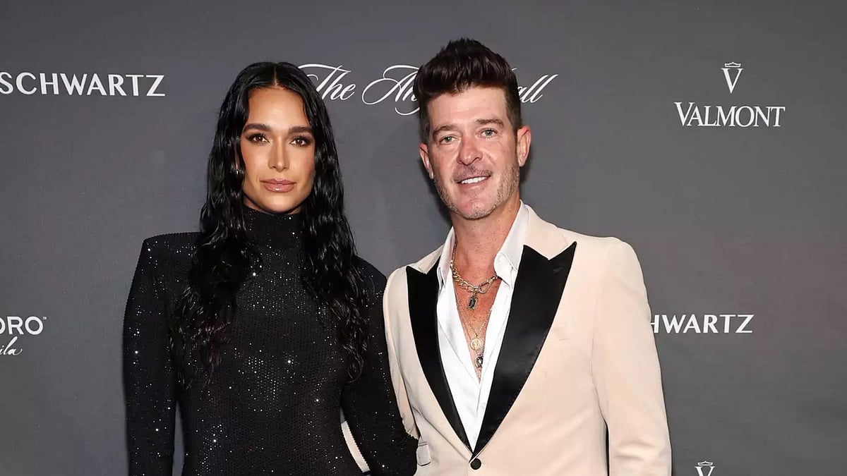 X : Robin Thicke and April Love Geary
