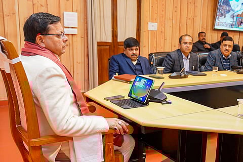 CM Dhami meets officials in Dehradun