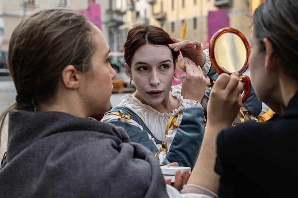 Representative Image/Getty Images : An actress of the company Atelier Teatro applies her make-up with a powder puff and mirror ahead of performing the tragicomedy “Florio e Isabella” |