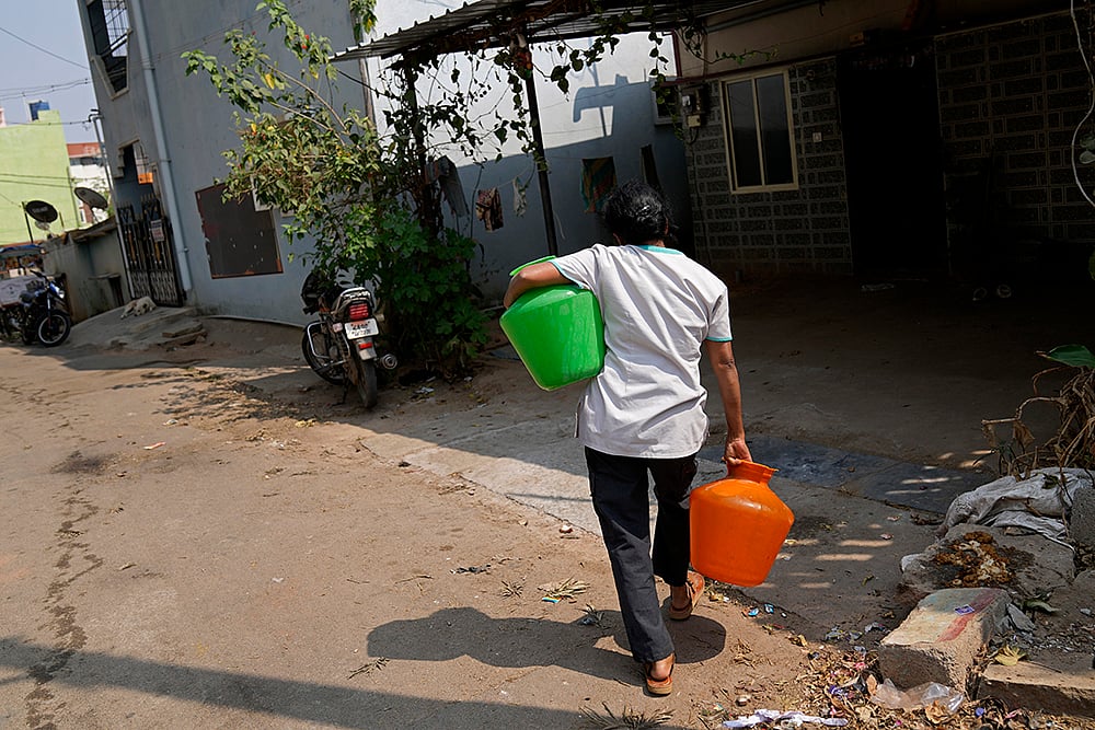 | Photo: AP/Aijaz Rahi : Bengaluru Water Crisis