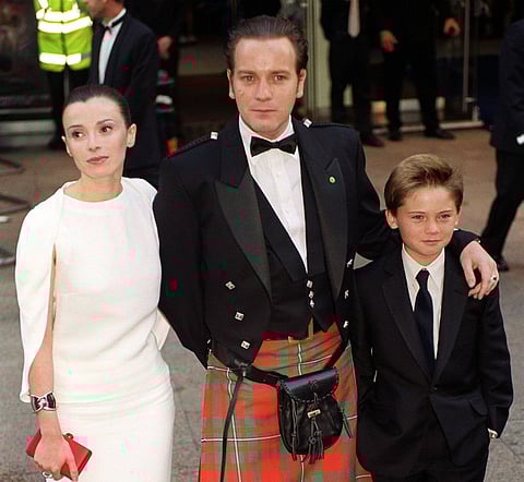 Actor Ewan McGregor (centre), who played Obi-Wan Kenobi, and his wife Eve, and young actor Jake Lloyd, who played Anakin Skywalker, at the Royal Premiere of Star Wars: Episode 1, The Phantom Menace at Leicester Square, London.