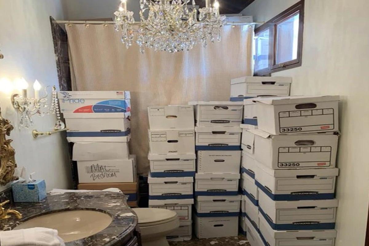 This image, contained in the indictment against former President Donald Trump, shows boxes of records stored in a bathroom and shower.  - AP