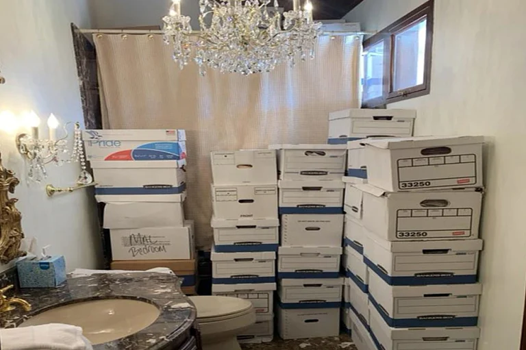 This image, contained in the indictment against former President Donald Trump, shows boxes of records stored in a bathroom and shower. - AP